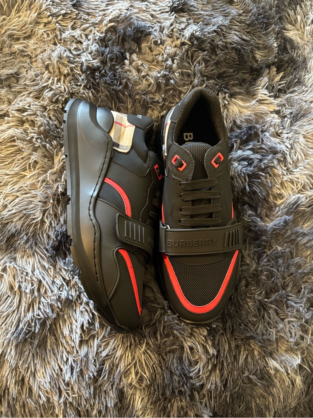 Burberry Black Sneakers with Red Accents and Signature Check Detail